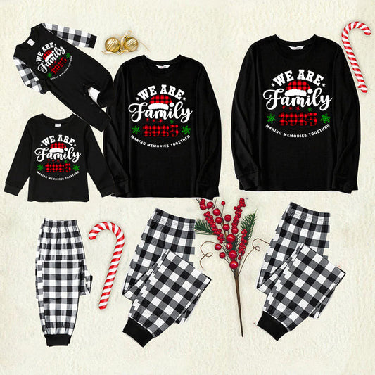 "We are Family2025" Santa Hat Monogram Print Black Long Sleeve Top with Black And White Plaid Pants Family Matching Pajamas